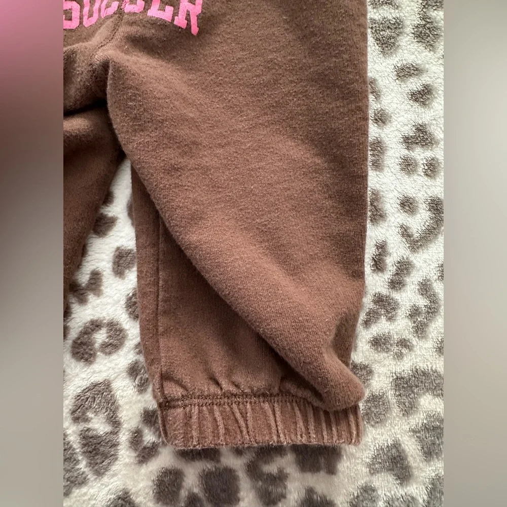 Old Navy Starfish Soccer Graphic Jogger Pants in Brown Size 6-12 Months